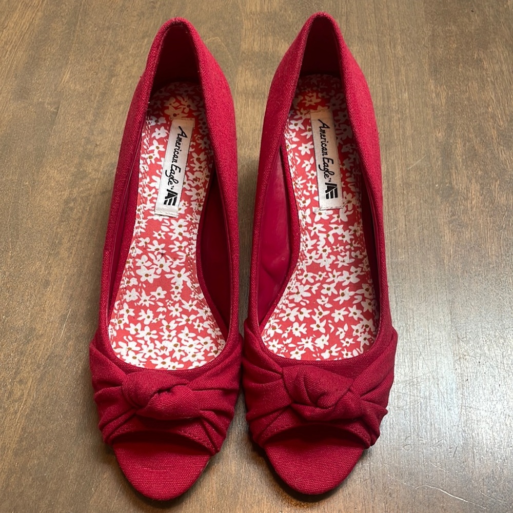Red American eagle shirt heels